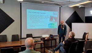 Joel OH64K speaking about DAB+ broadcasting using an SDR in an amateur event